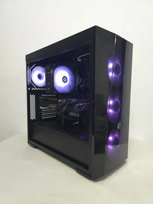 Black glass-fronted PC with purple illuminated fans